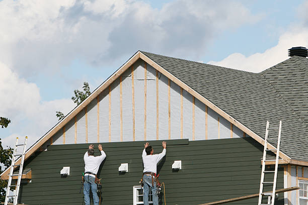 Professional Siding Installation technician working in Hollywood, FL